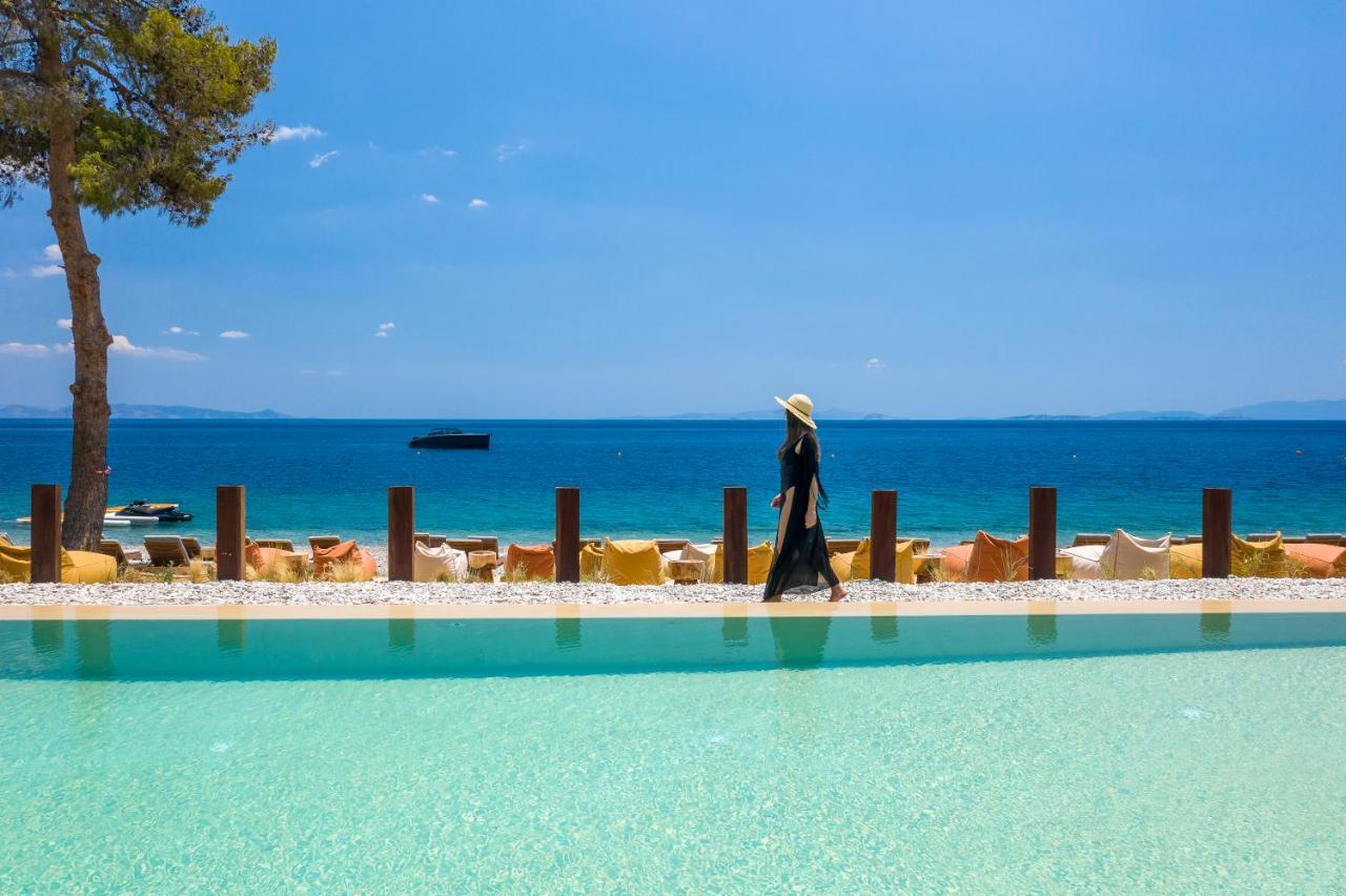 Isla Brown Corinthia Resort & Spa, Curio Collection By Hilton Agioi Theodoroi Exterior foto The beach at the hotel