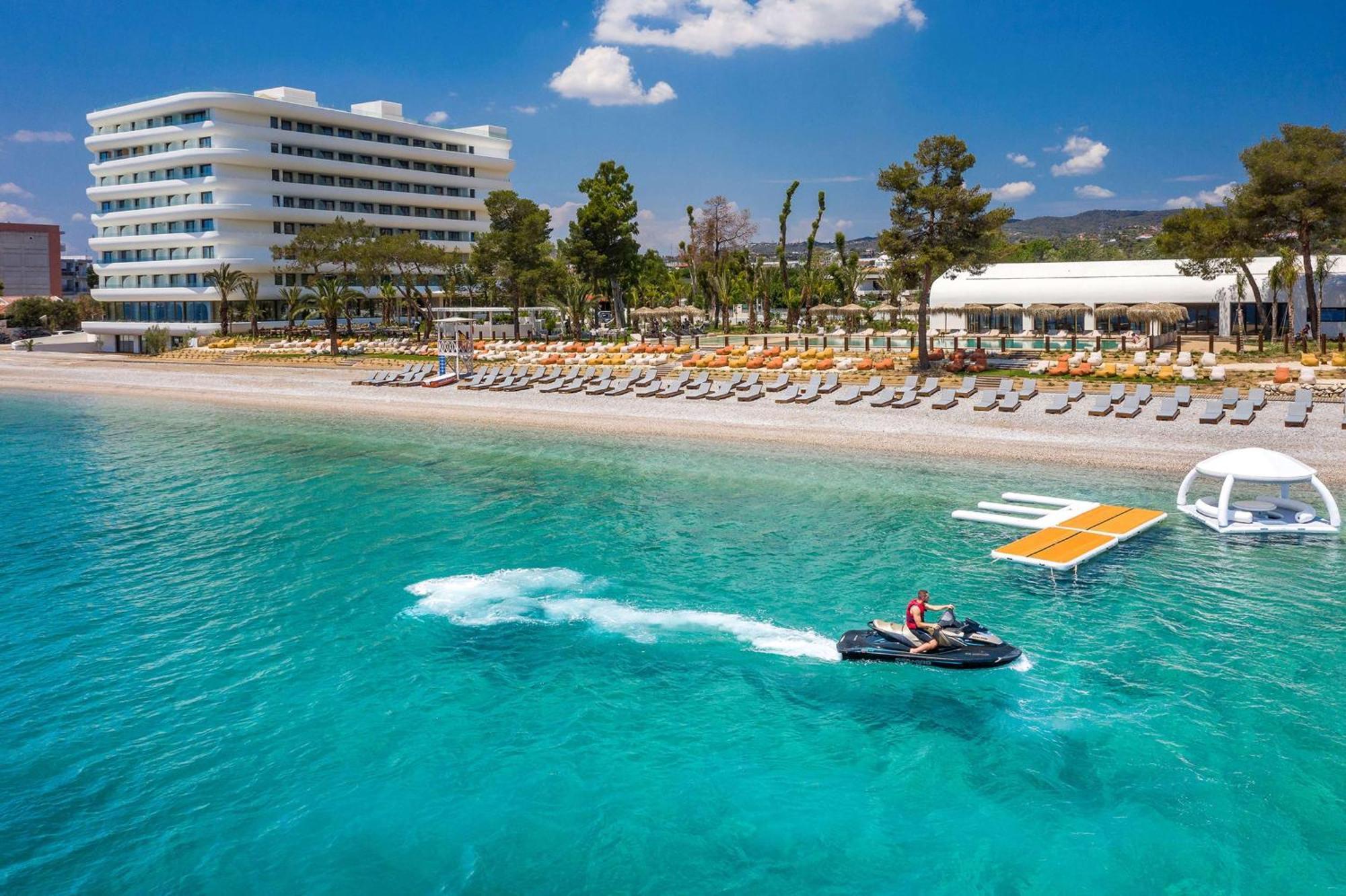 Isla Brown Corinthia Resort & Spa, Curio Collection By Hilton Agioi Theodoroi Exterior foto The resort's beach