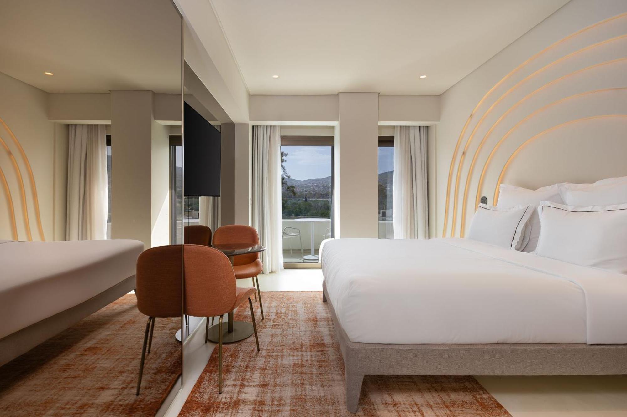 Isla Brown Corinthia Resort & Spa, Curio Collection By Hilton Agioi Theodoroi Habitación foto A room at the hotel