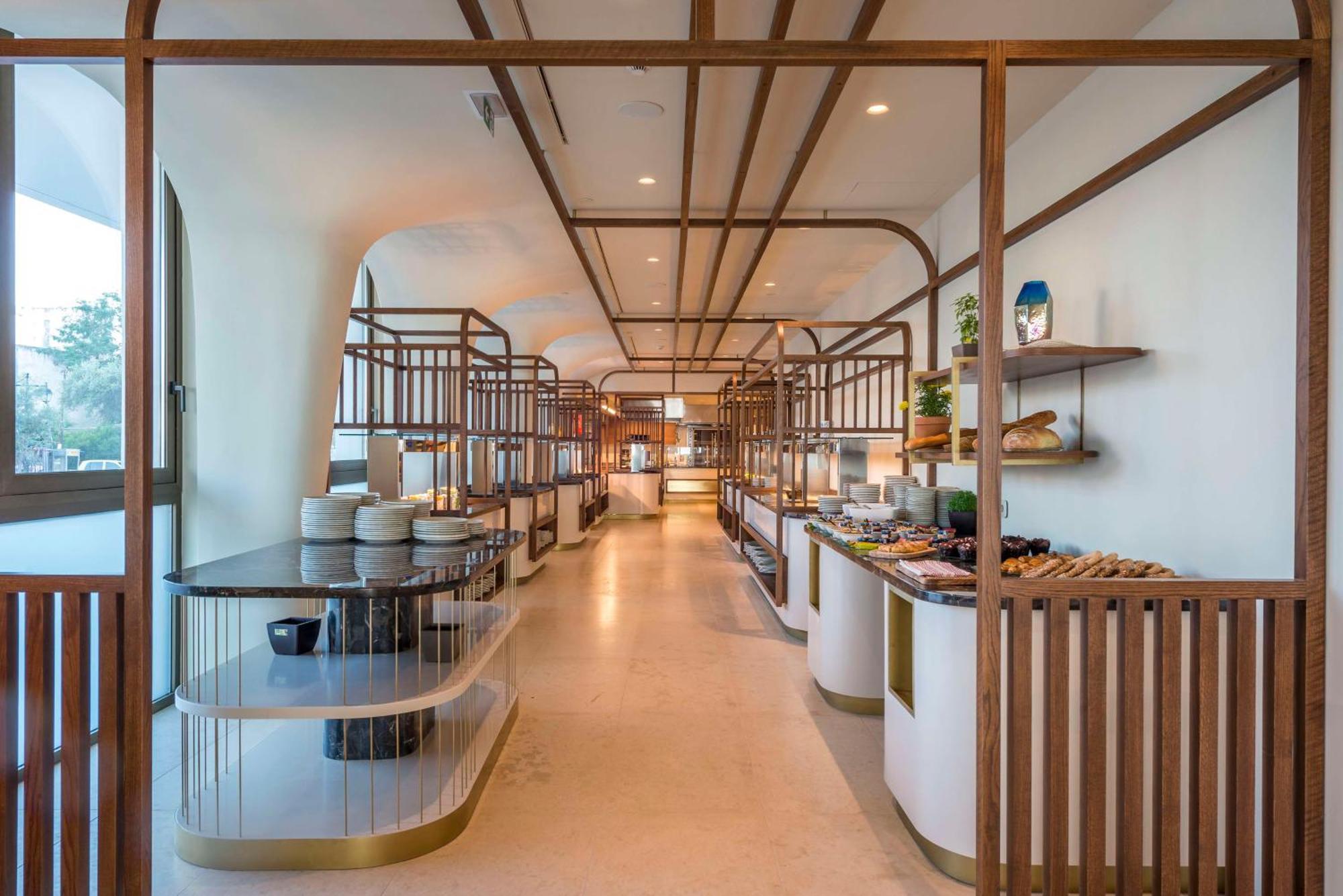 Isla Brown Corinthia Resort & Spa, Curio Collection By Hilton Agioi Theodoroi Exterior foto The interior of the lounge